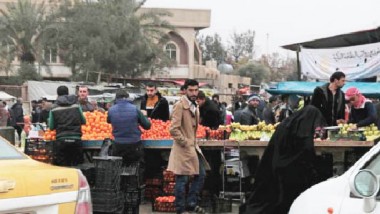 شريان التجارة ينبض في شرقي الموصل برغم هول الحرب