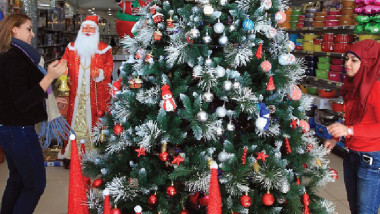 بغداد تتزين بأشجار الميلاد استعداداً للاحتفال بالسنة الجديدة