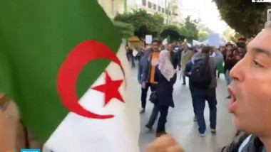 مناوشات بين مؤيدي الانتخابات ورافضيها خلال مسيرة ضد «التدخل الخارجي» في الجزائر
